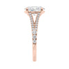 Oval cut diamond engagement ring with diamond set split band rose gold end view.
