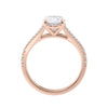 Oval cut diamond engagement ring with diamond set split band rose gold side view.
