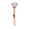 Round brilliant cut 3 stone diamond engagement ring 18ct rose gold end view.