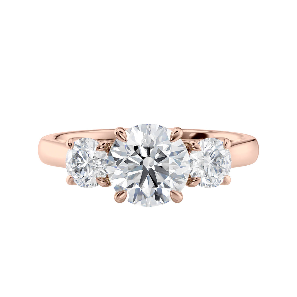 Round brilliant cut 3 stone diamond engagement ring 18ct rose gold front view.