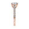 Natural round solitaire with a diamond band rose gold end view