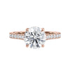 Natural round solitaire with a diamond band rose gold front view.