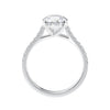 Natural round solitaire with a diamond band white gold side view.