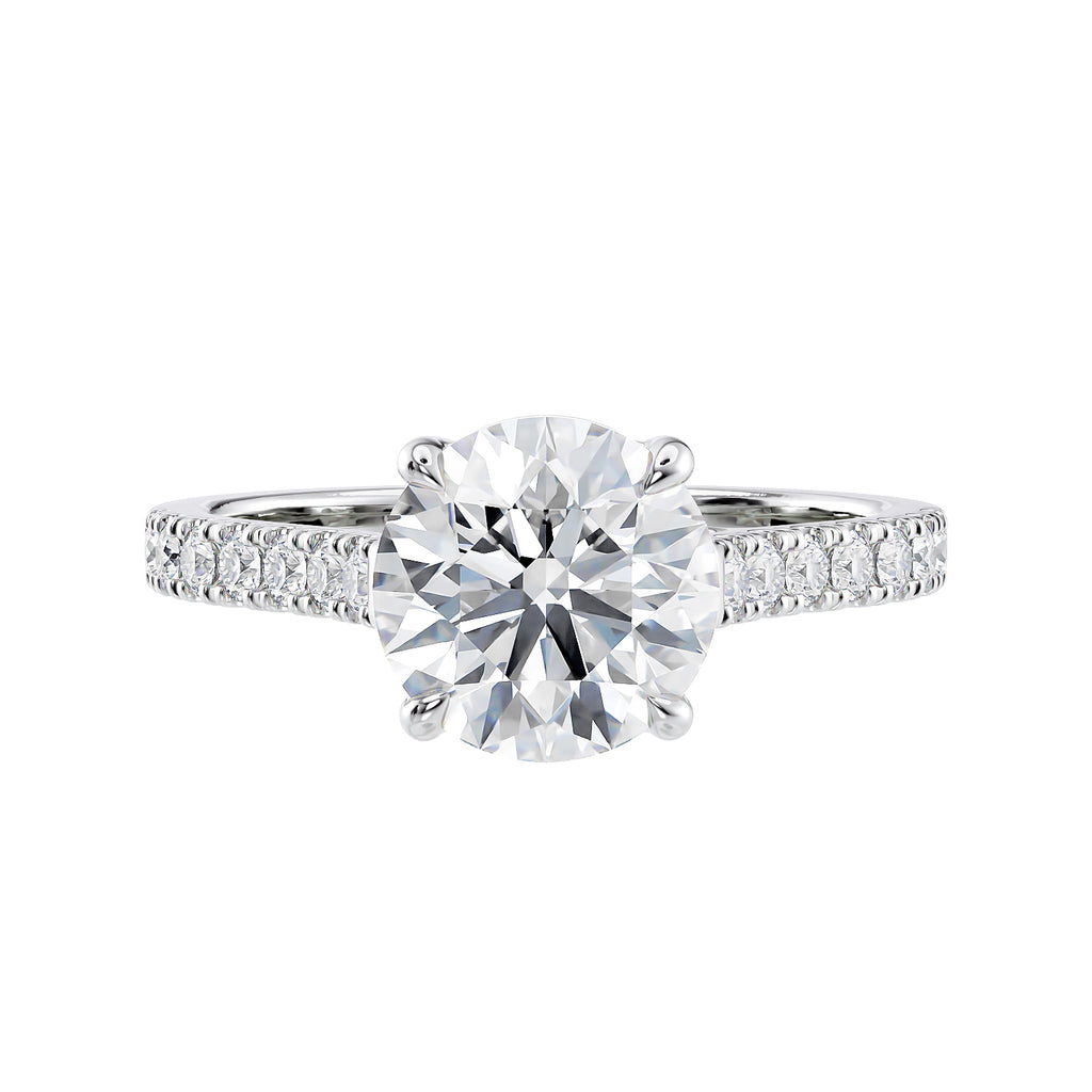 Natural round solitaire with a diamond band white gold front view.