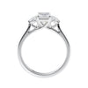 Emerald cut 3 stone laboratory grown diamond engagement ring 18ct white gold side view.