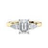Emerald cut diamond engagement ring with pear sides 18ct yellow gold front view.