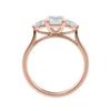 Emerald cut diamond engagement ring with pear sides 18ct rose gold side view.