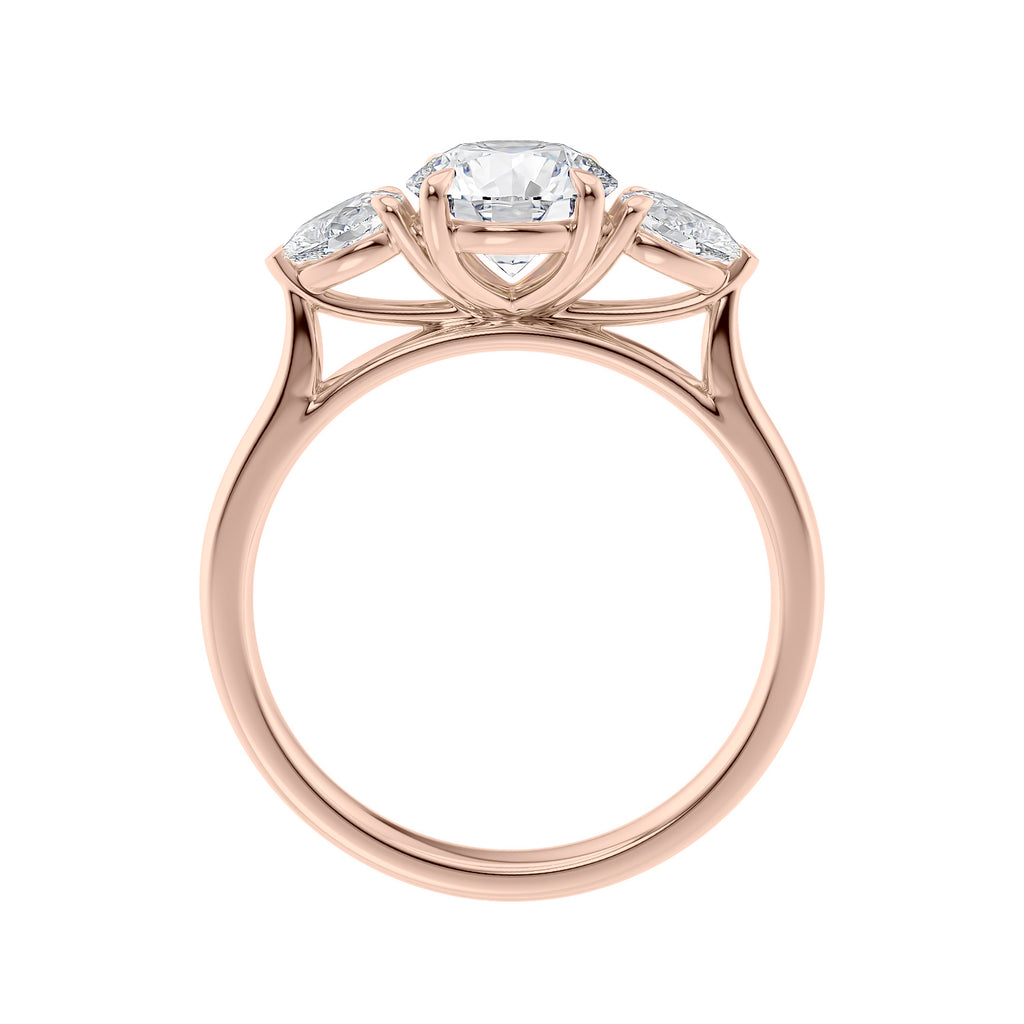 Round 3 stone natural diamond engagement ring with pear shoulders in rose gold side view.