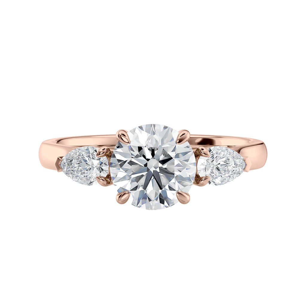 Round 3 stone natural diamond engagement ring with pear shoulders in rose gold front view.