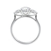 Round 3 stone natural diamond engagement ring with pear shoulders in white gold side view.