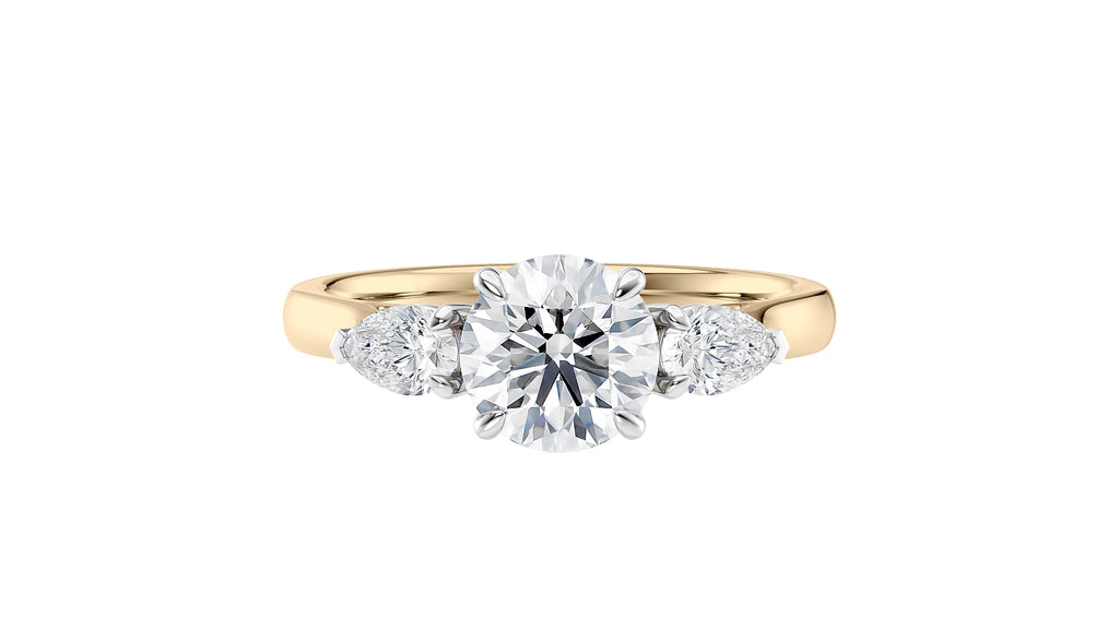 Round and Pear Cut Trilogy Diamond Engagement Ring