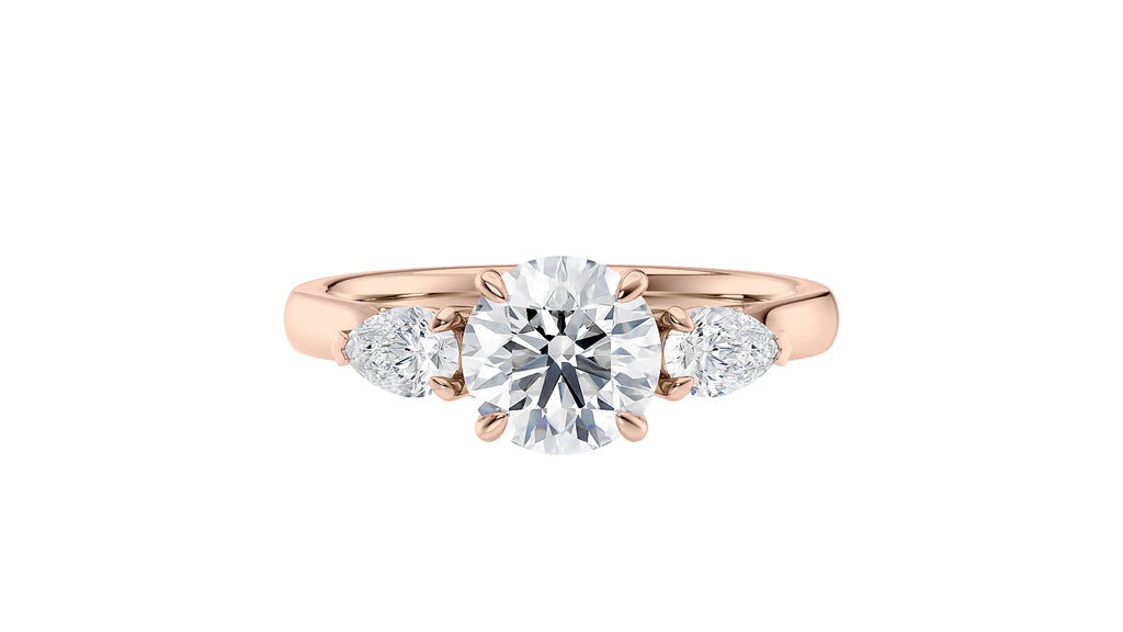 Round and Pear Cut Trilogy Diamond Engagement Ring
