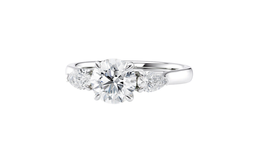 Round and Pear Cut Trilogy Diamond Engagement Ring