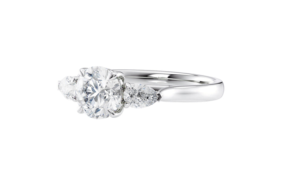 Round and Pear Cut Trilogy Diamond Engagement Ring