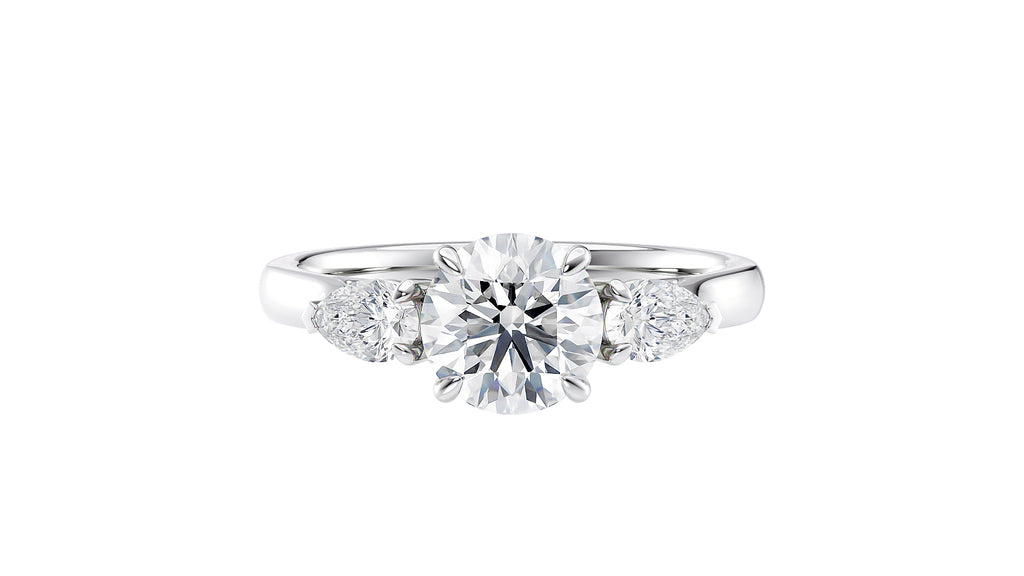 Round and Pear Cut Trilogy Diamond Engagement Ring