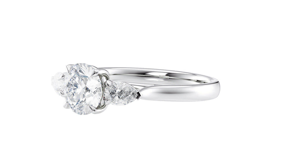 Round and Pear Cut Trilogy Diamond Engagement Ring