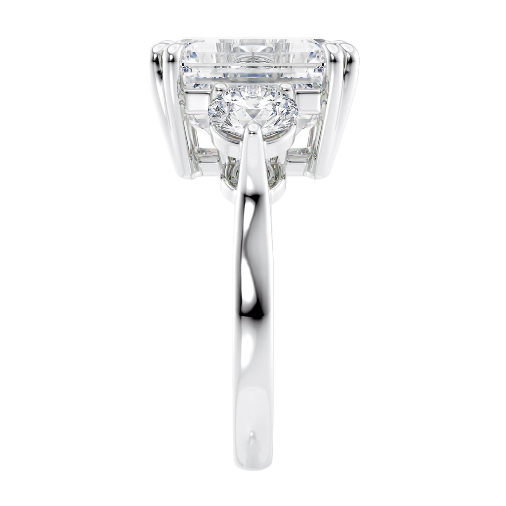 Emerald cut 3 stone lab grown diamond engagement ring white gold end view.