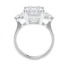 Emerald cut 3 stone lab grown diamond engagement ring white gold side view.
