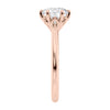 Rose gold 6 claw solitaire diamond engagement ring end view.