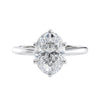 6 claw oval solitaire mined diamond engagement ring white gold front view.