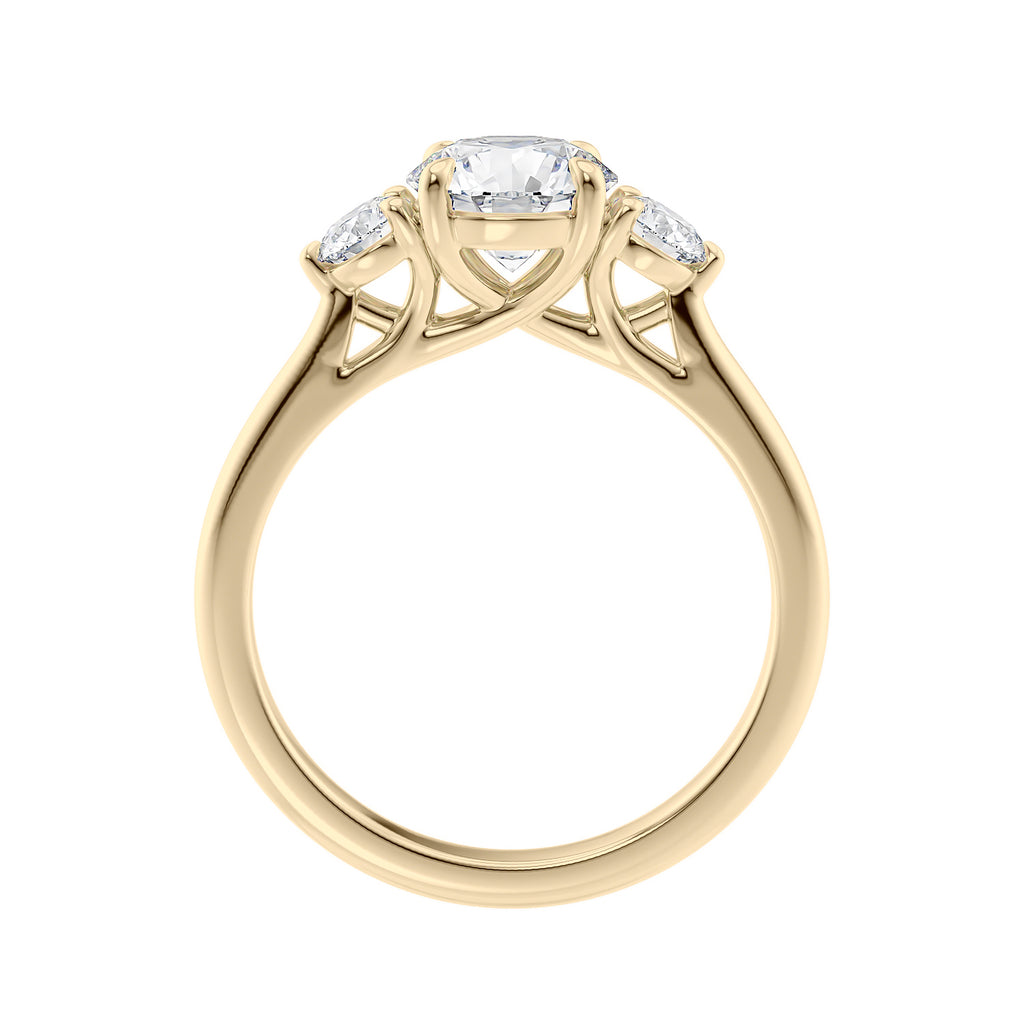 Round brilliant cut diamond 3 stone engagement ring with small side diamonds 18ct gold side view.