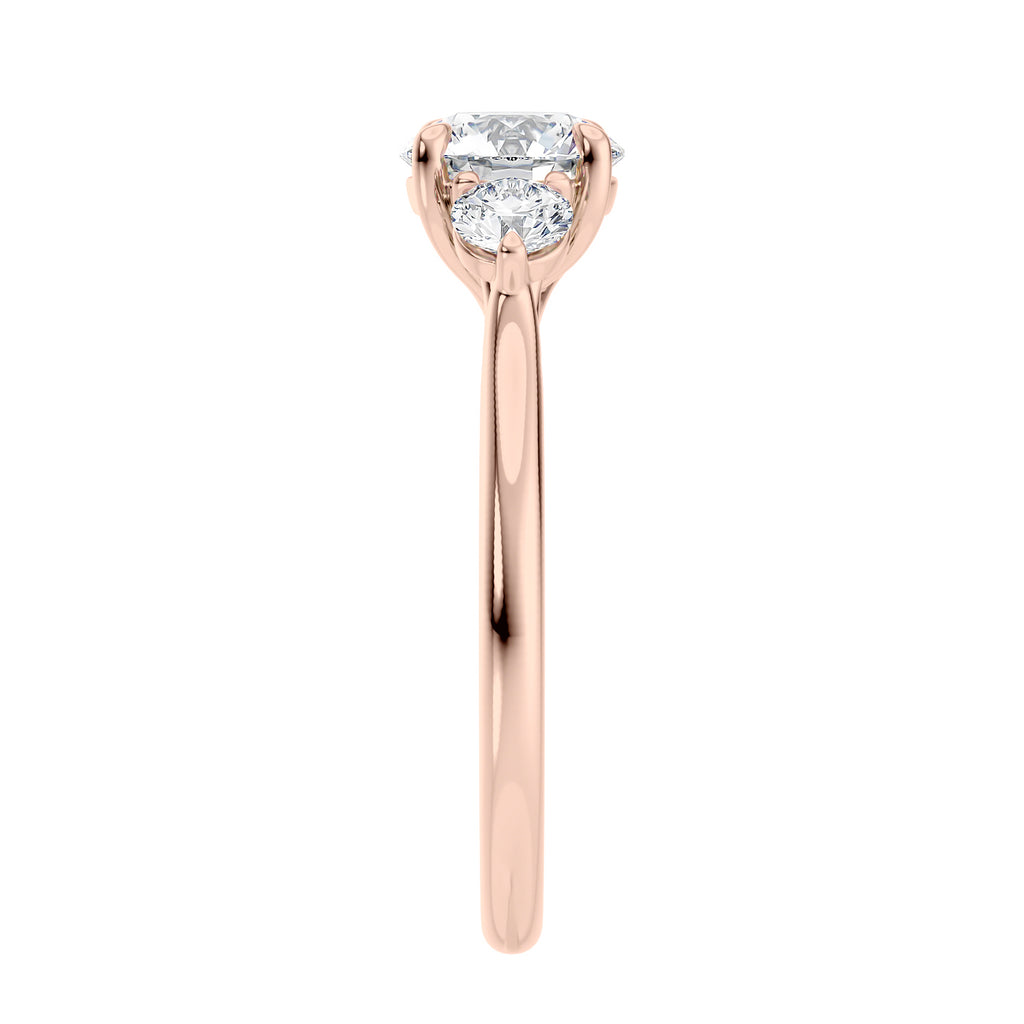Round brilliant cut diamond 3 stone engagement ring with small side diamonds rose gold end view.