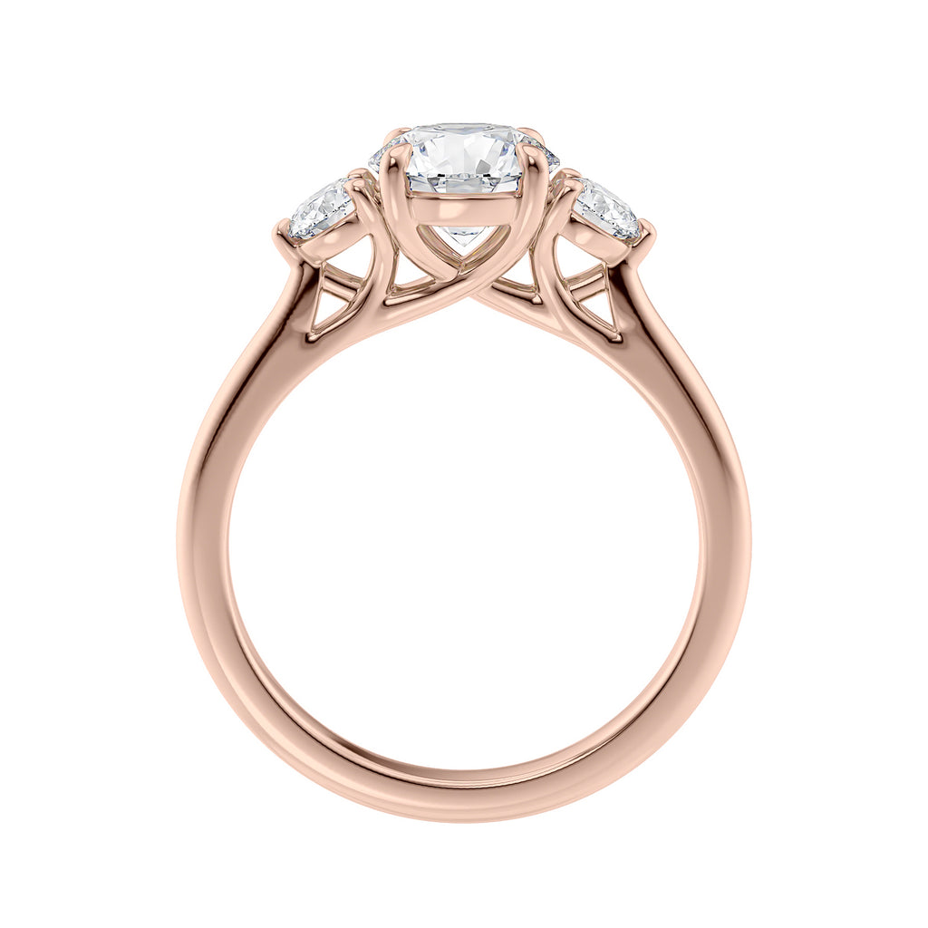 Round brilliant cut diamond 3 stone engagement ring with small side diamonds rose gold side view.