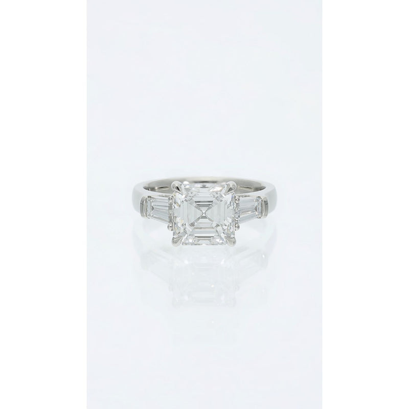Asscher cut diamond ring with baguette side stones in platinum