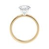 Lab grown solitaire diamond engagement ring with thin band yellow gold side view.