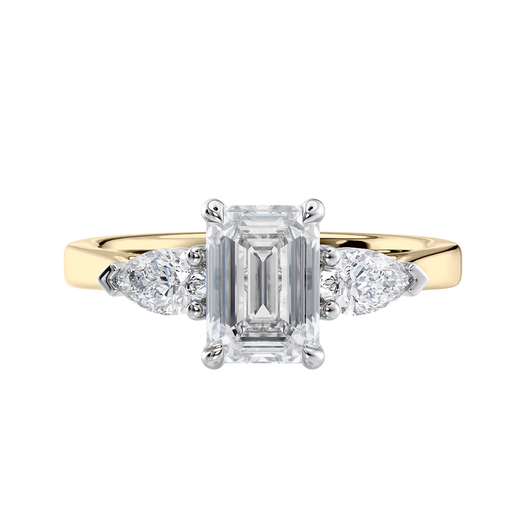 Emerald cut diamond engagement ring with pear cut sides 18ct  gold front view.