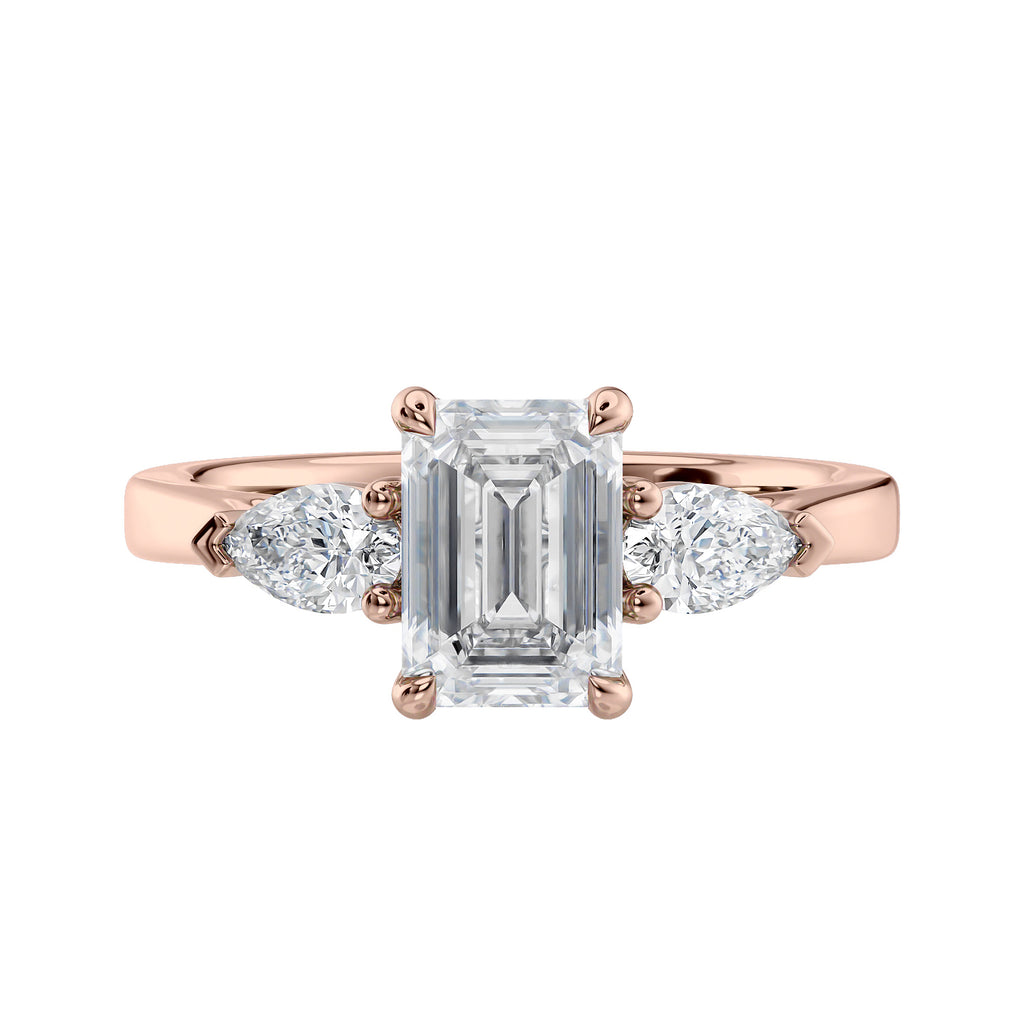 Emerald cut diamond engagement ring with pear cut sides 18ct rose gold front view.