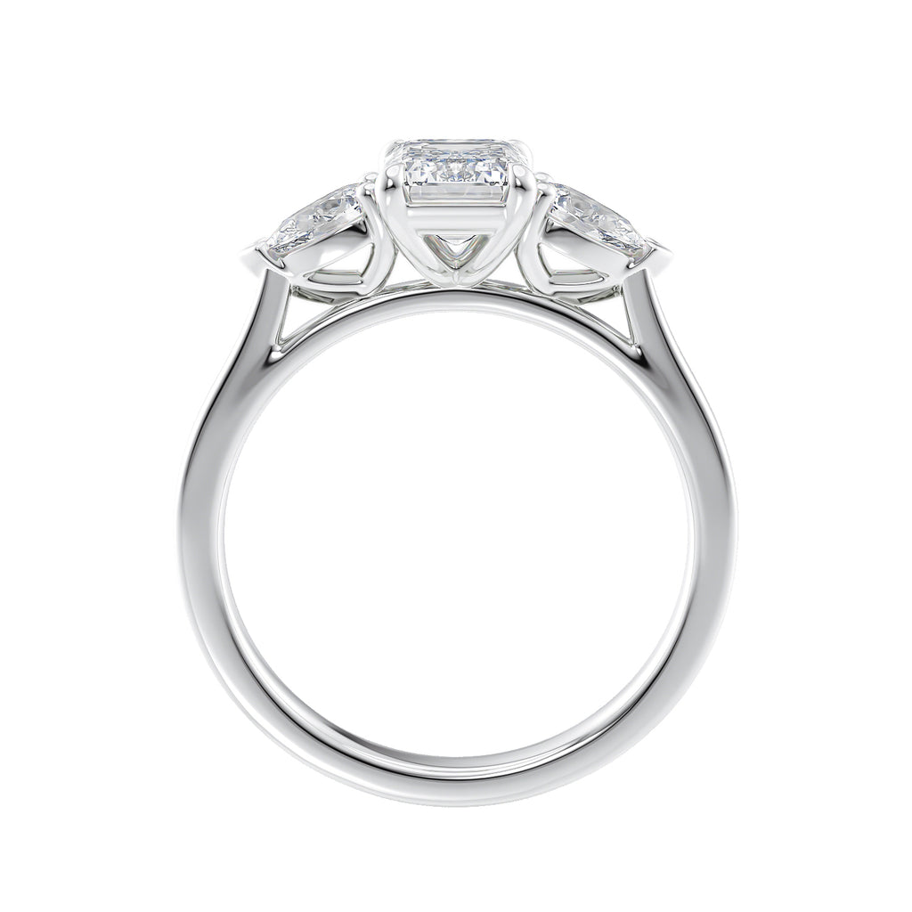 Emerald cut diamond engagement ring with pear cut sides white gold side view.