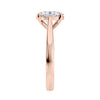 Lab grown oval cut diamond engagement ring with tapered band rose gold end view.