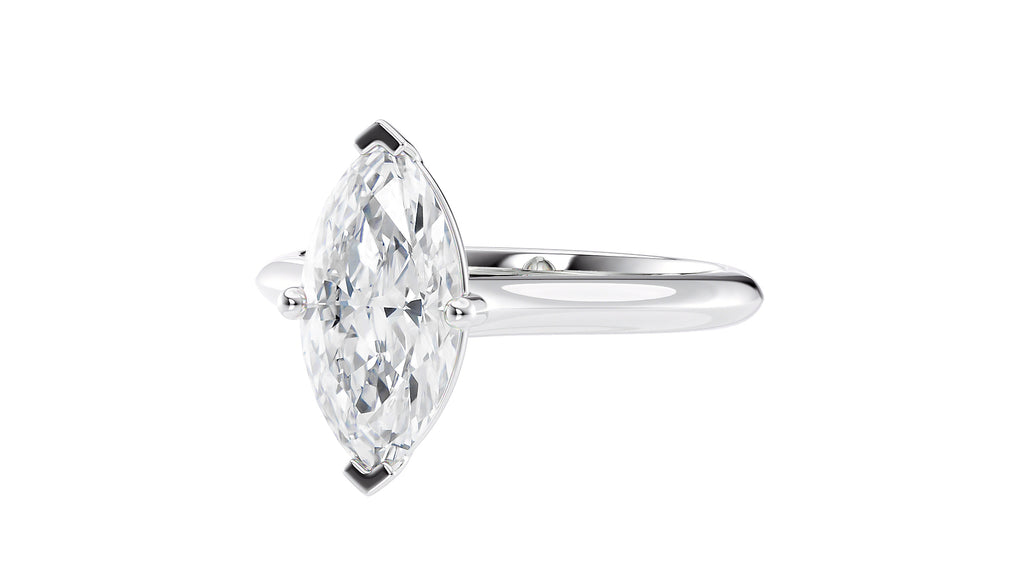 Marquise Cut Solitaire With Diamond Bridge Engagement Ring