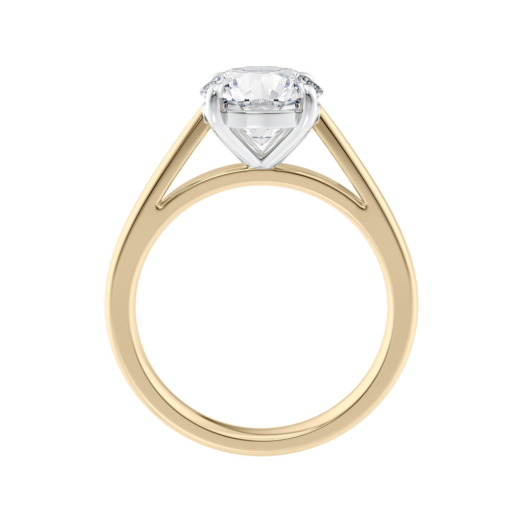 Round cut diamond solitaire engagement ring gold side view.
