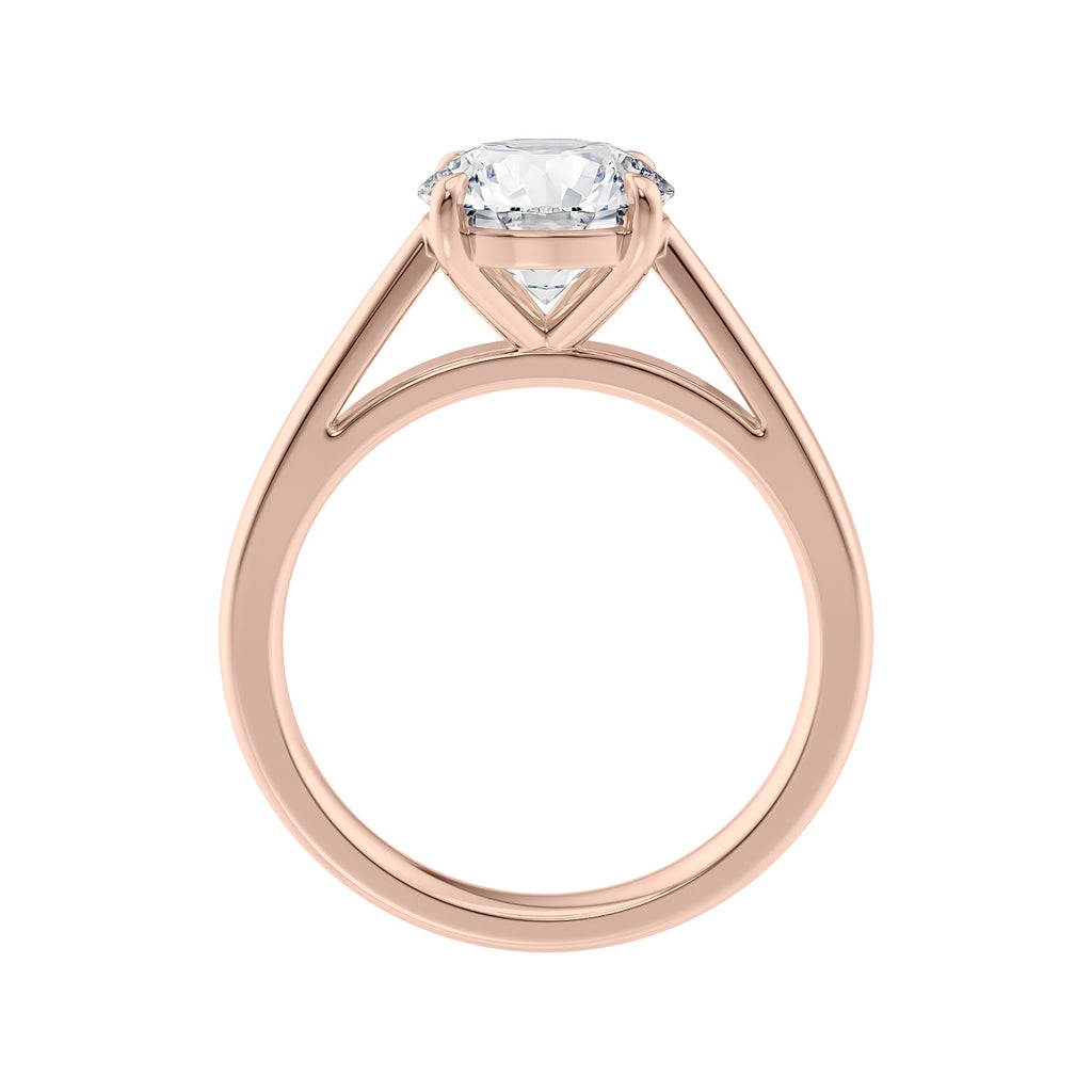 Round cut diamond solitaire engagement ring rose gold side view.