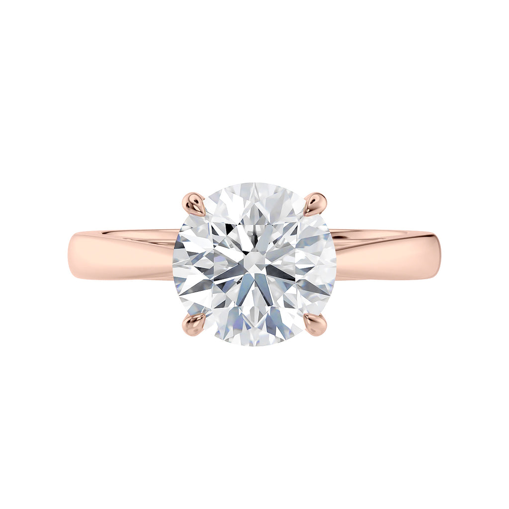 Round cut diamond solitaire engagement ring rose gold front view.