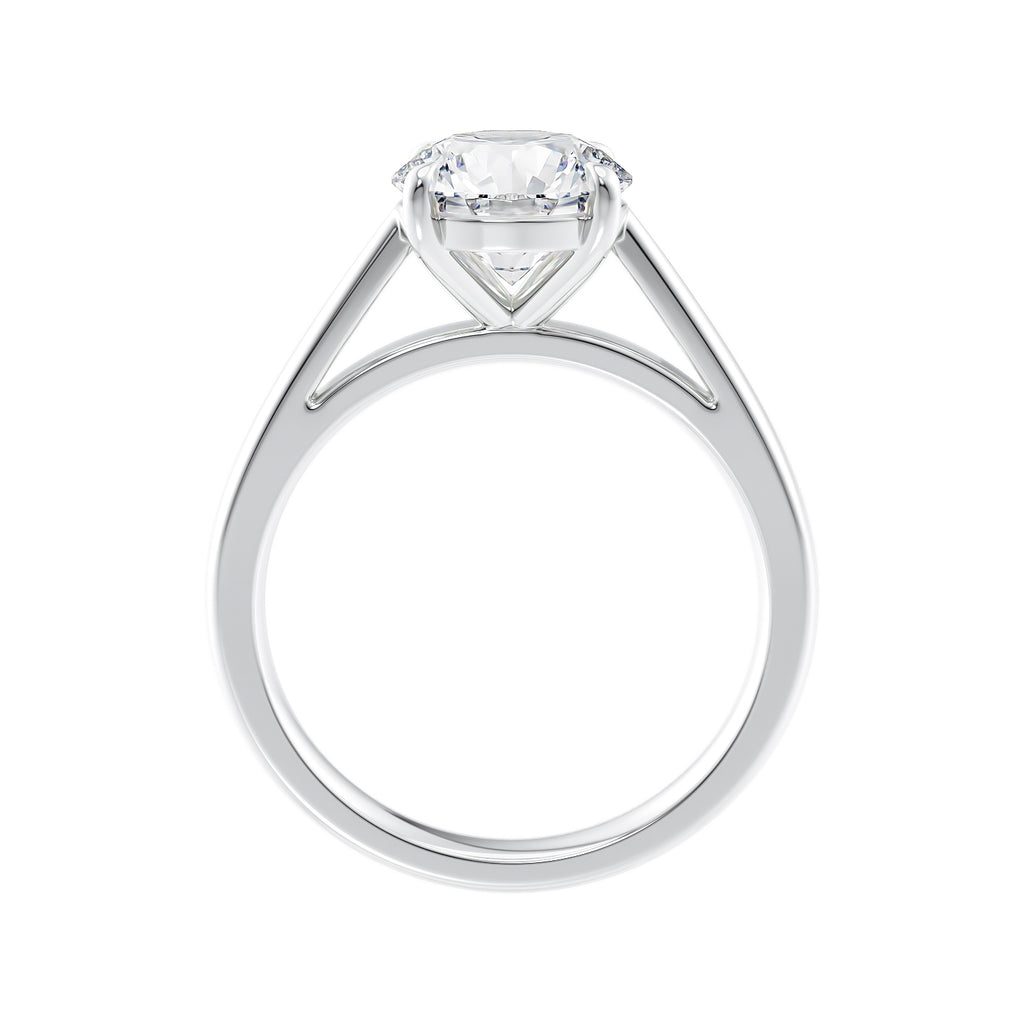 Round cut diamond solitaire engagement ring white gold side view.