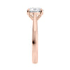 Rose gold tapered band natural round diamond engagement ring end view.