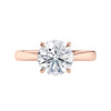 Rose gold tapered band natural round diamond engagement ring front view.
