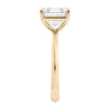 Asscher cut solitaire diamond engagement ring gold end view.