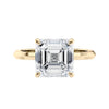 Asscher cut solitaire diamond engagement ring gold front view.