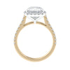 Cushion cut diamond halo style engagement ring 18ct gold side view.