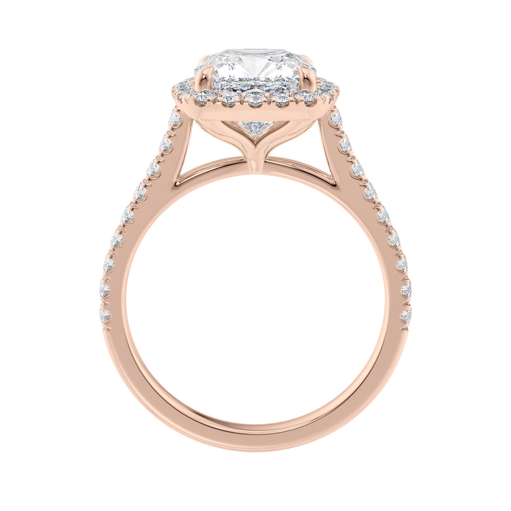 Cushion cut diamond halo style engagement ring 18ct rose gold side view.