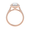 Cushion cut diamond halo style engagement ring 18ct rose gold side view.