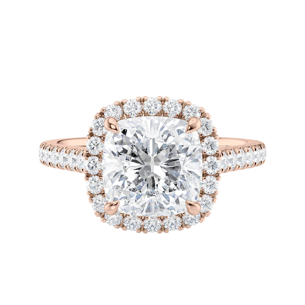 Cushion cut diamond halo style engagement ring 18ct rose gold front view.