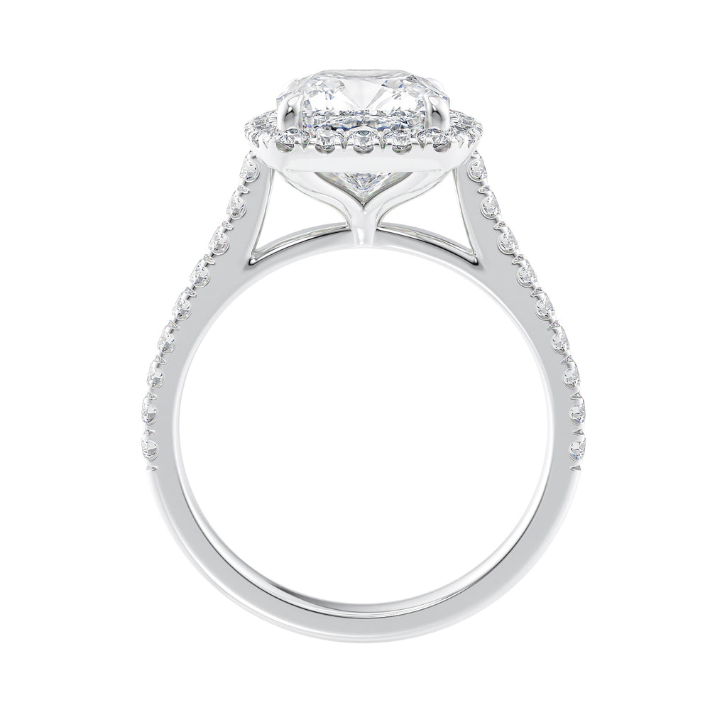 Cushion cut diamond halo style engagement ring white gold side view.