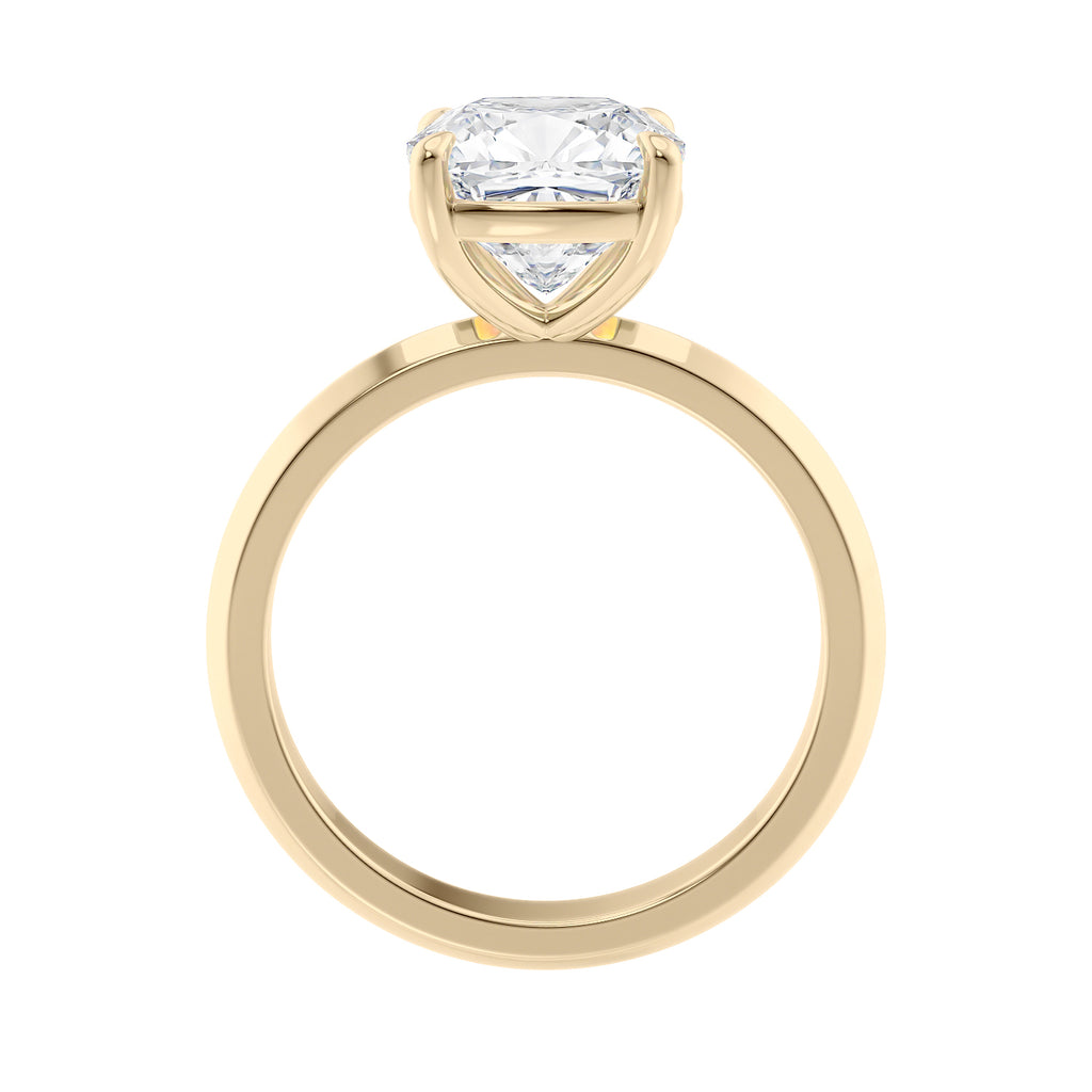 Cushion cut laboratory grown diamond engagement ring gold side view.