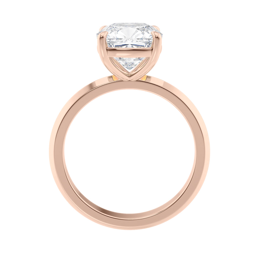 Natural cushion cut diamond solitaire engagement ring rose gold side view.