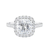 Cushion cut natural diamond halo style engagement ring white gold front view.